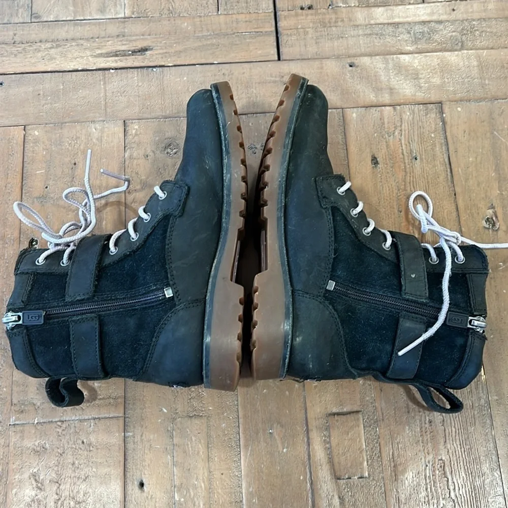 Ugg Koren black leather buckle strap lug sole boots